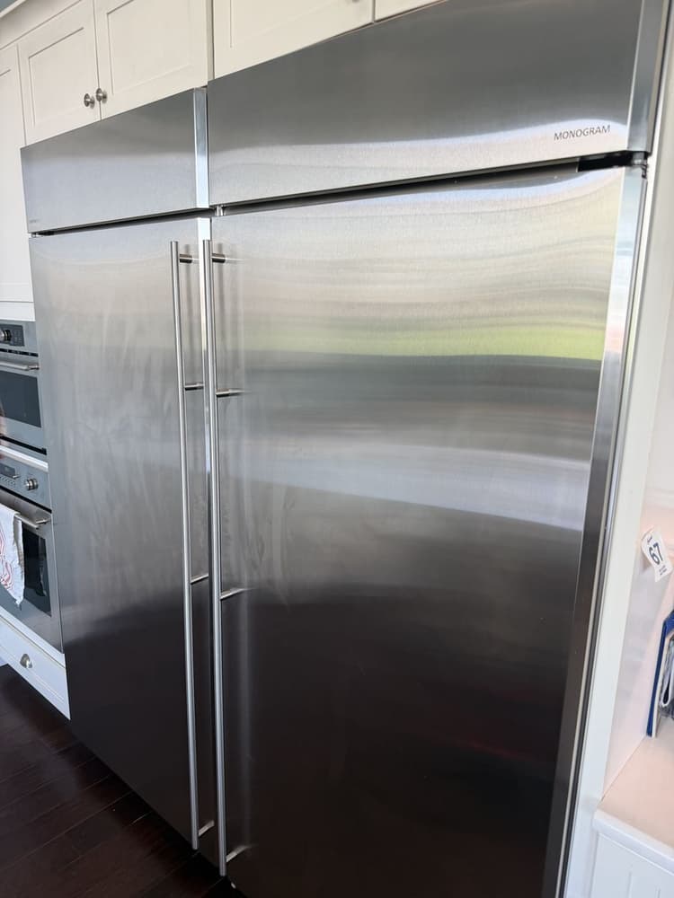 GE Monogram built-in refrigerator and freezer pair in a Tampa Bay kitchen during a service call