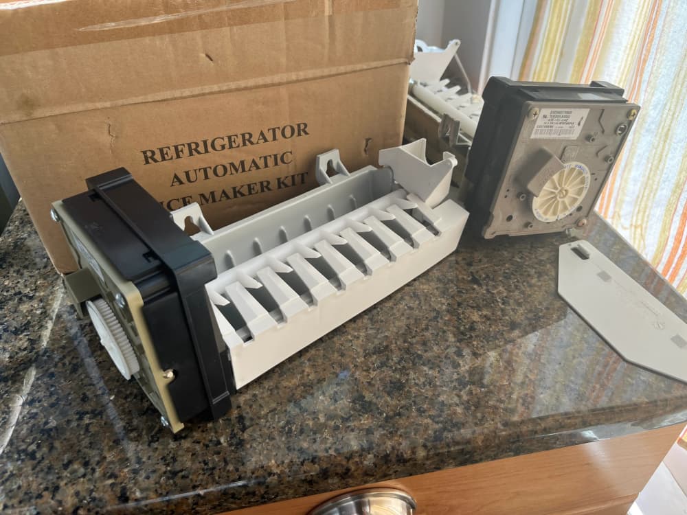 Refrigerator ice maker kit unboxed and ready to install
