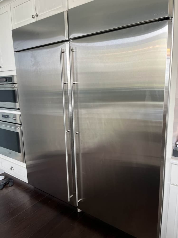 GE Monogram built-in refrigerator and freezer columns serviced in a Dade City kitchen