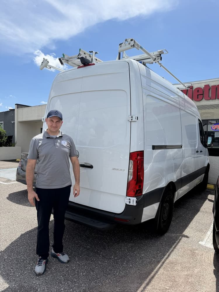 Anatoli Didenco with the Perfect Appliance Repair Tampa service van