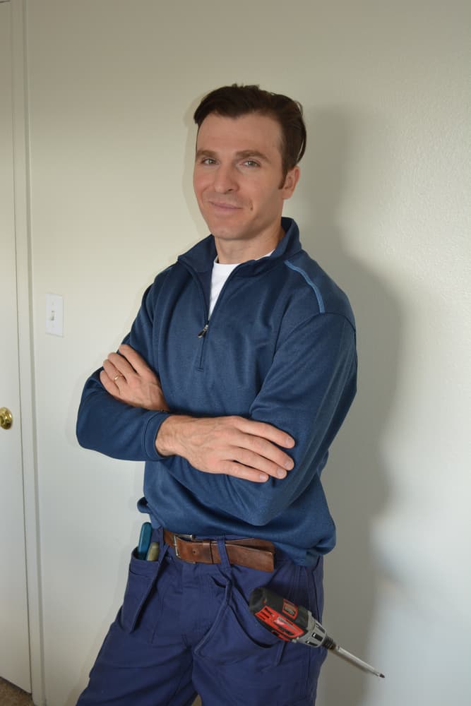 Perfect Appliance Repair Tampa technician with tool belt and drill, ready for a dryer service call
