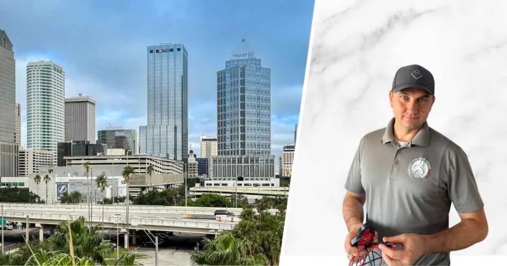 Owner-technician of Perfect Appliance Repair Tampa with the downtown Tampa skyline — Turbo Air commercial refrigeration service across Tampa Bay