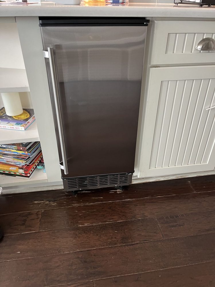 Ice maker pulled out for service in a Wesley Chapel kitchen
